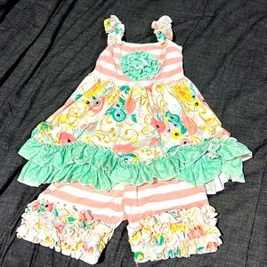 Adorable boutique find two piece spring swing dress and short pants.